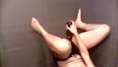 Sexy blonde girl fucks herself with a dildo